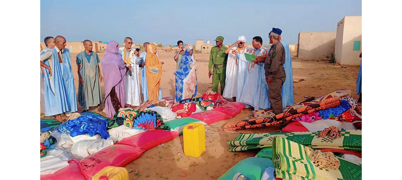 مفوضية الأمن الغذائي توزع مساعدات على المتضررين من الأمطار في اتويجگجيت